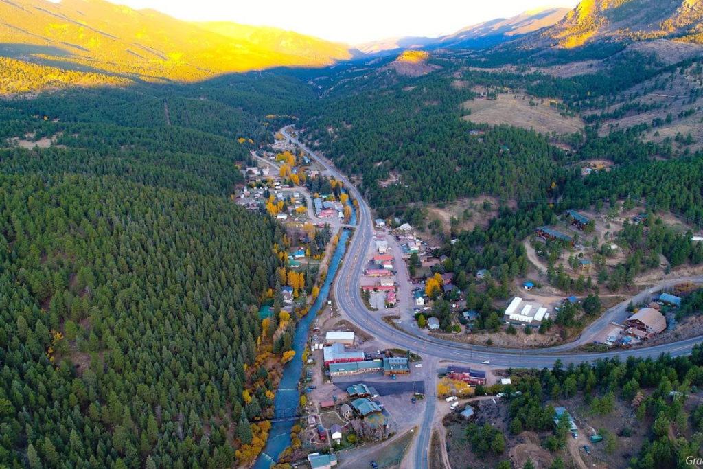 Aerial view of Bailey, Colorado surrounded by Pike National Forest and the Rocky Mountains