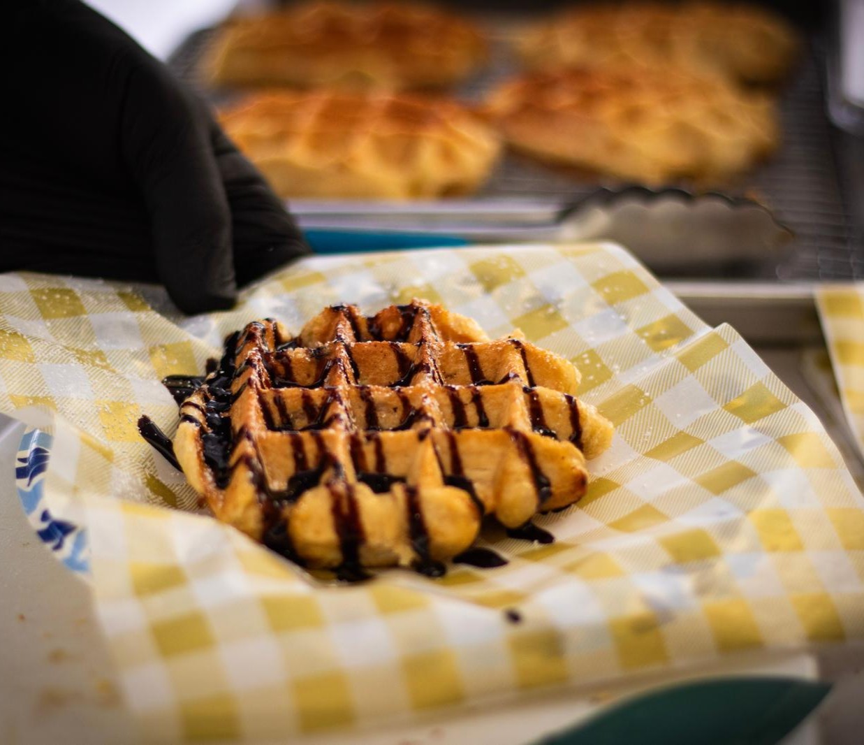 Fresh gluten-free Liège waffle with strawberries served at a Denver event